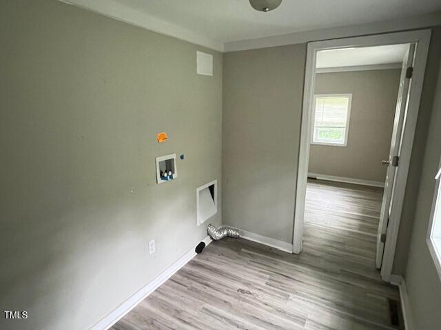 7710 Leasburg Road Roxboro, NC 27574 - Photo 20 of 24 a view of a room with wooden floor and a bathroom