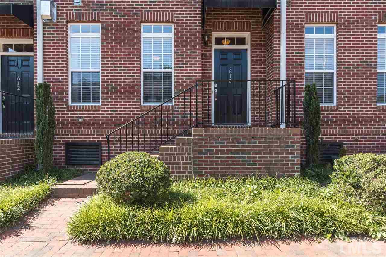 610 Highpark Lane Raleigh, NC 27608 - Photo 2 of 25 a view of brick house with a large window
