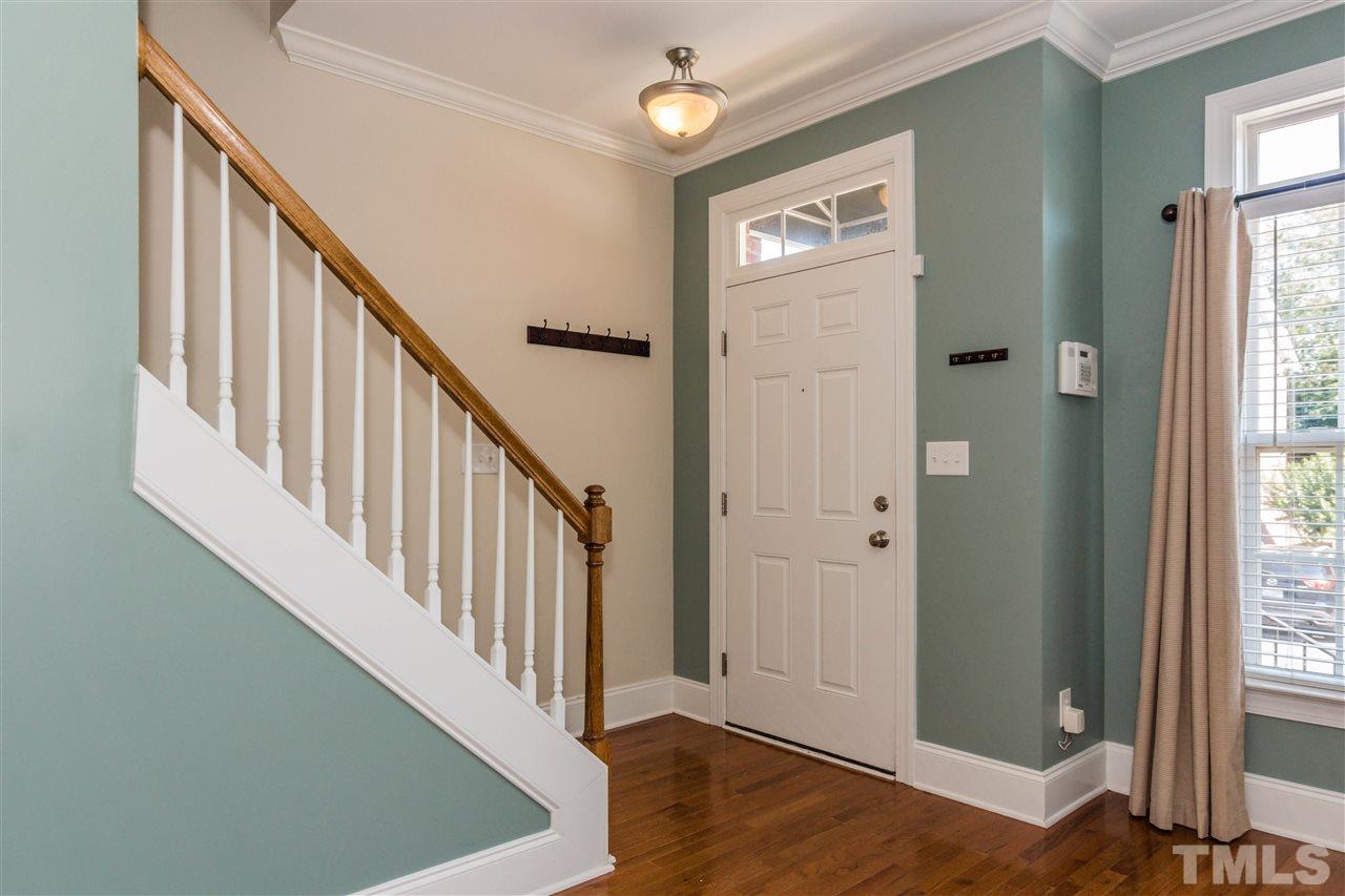 610 Highpark Lane Raleigh, NC 27608 - Photo 3 of 25 a view of an entryway with wooden floor