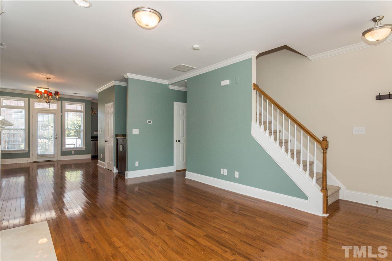 610 Highpark Lane Raleigh, NC 27608 - Photo 7 of 25 a view of an entryway with wooden floor
