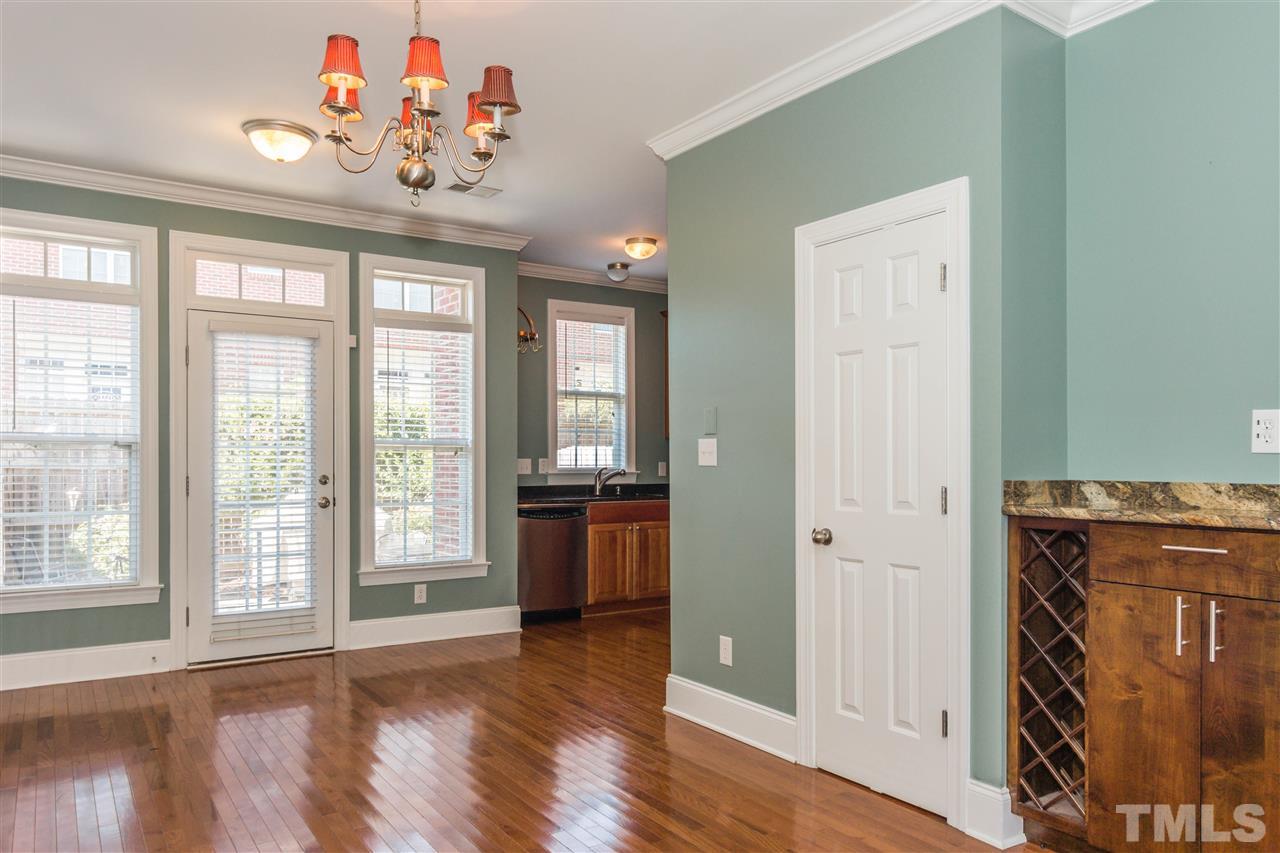 610 Highpark Lane Raleigh, NC 27608 - Photo 10 of 25 a view of an entryway with wooden floor