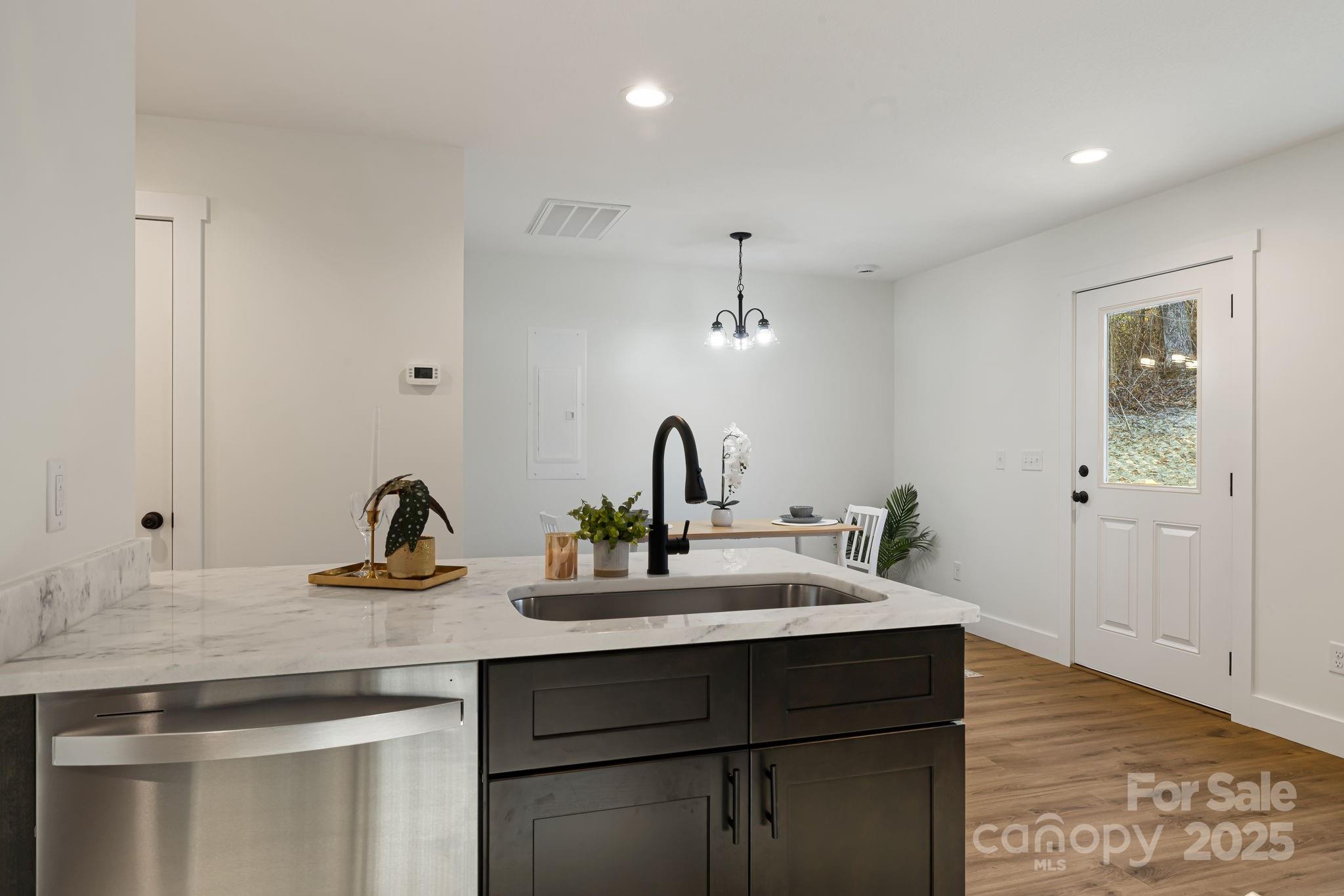 386 Holtzclaw Street Canton, NC 28716 - Photo 19 of 43 a bathroom with a sink and a mirror