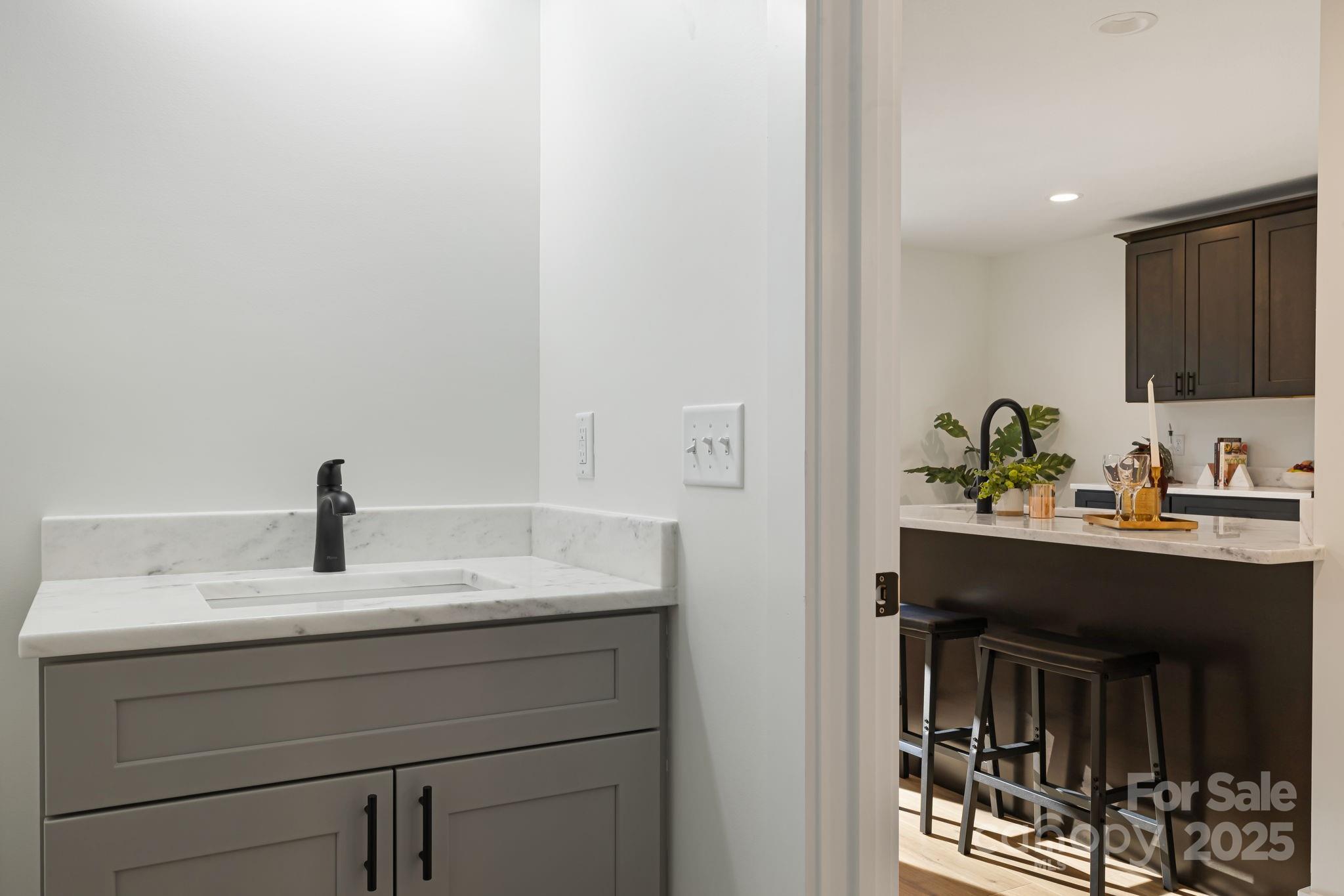 386 Holtzclaw Street Canton, NC 28716 - Photo 24 of 43 a sink sitting next to a bathroom