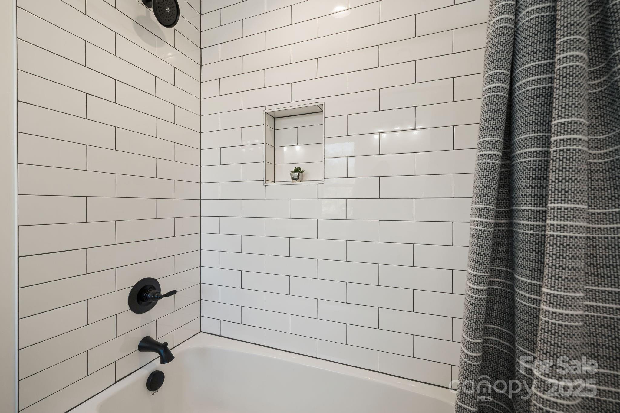 386 Holtzclaw Street Canton, NC 28716 - Photo 32 of 43 a bathroom with a shower