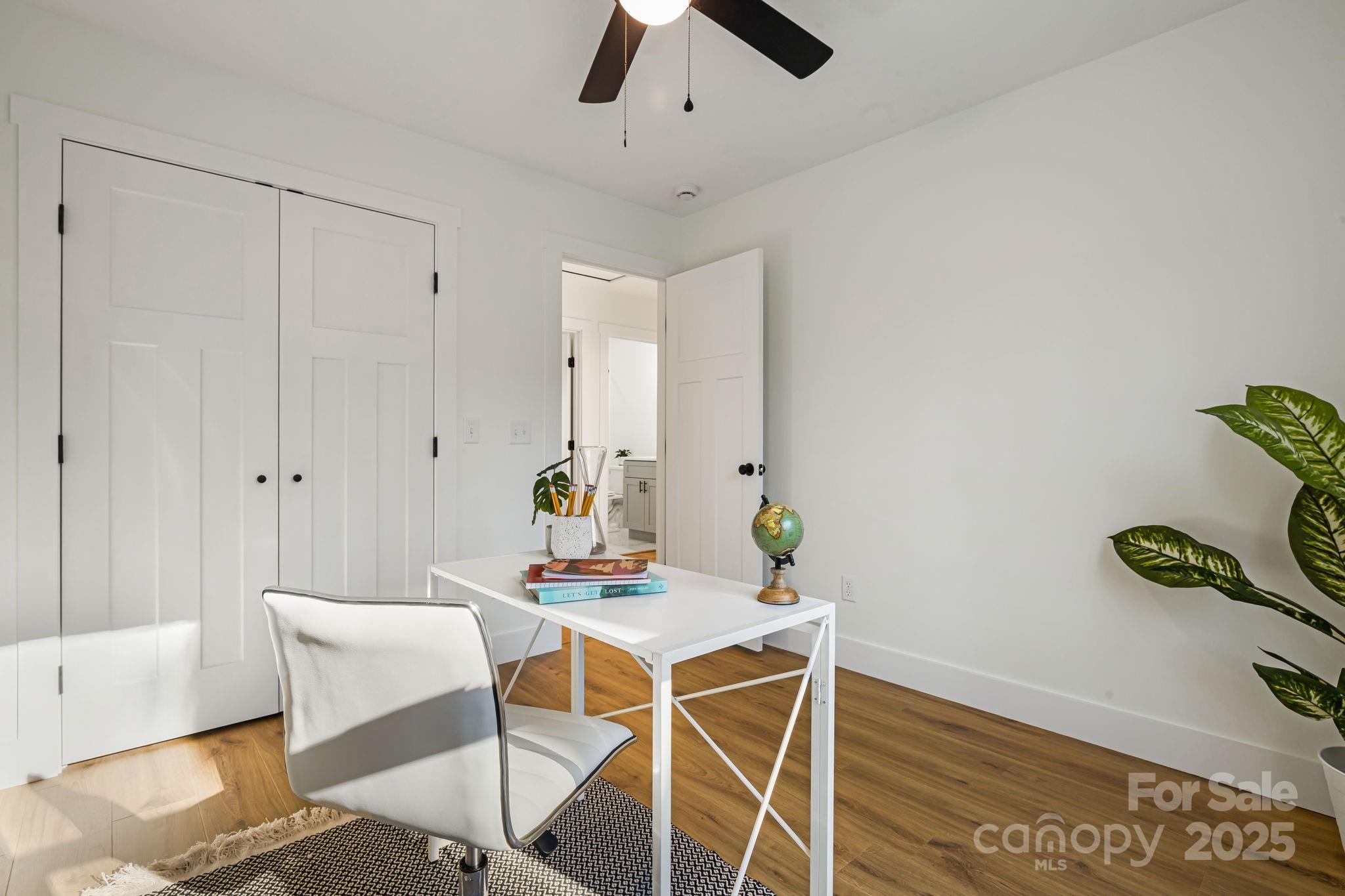 386 Holtzclaw Street Canton, NC 28716 - Photo 34 of 43 a workspace with furniture and window