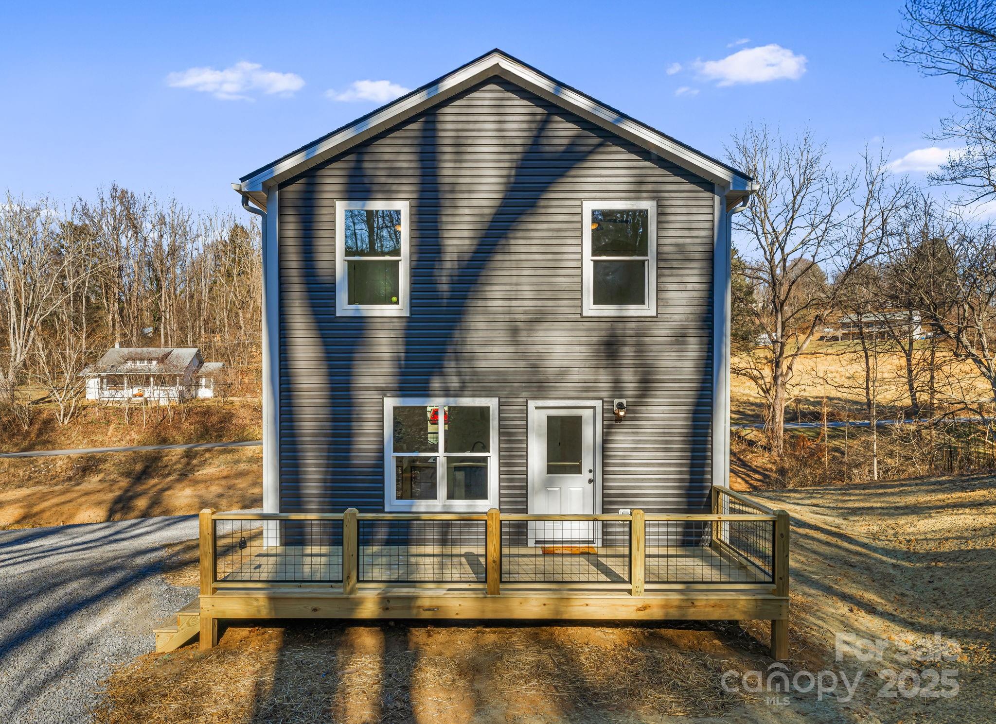386 Holtzclaw Street Canton, NC 28716 - Photo 4 of 43 a view of a house with pool