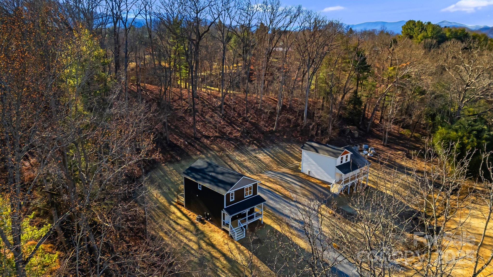 386 Holtzclaw Street Canton, NC 28716 - Photo 41 of 43 a view of an outdoor sitting area with brick wall