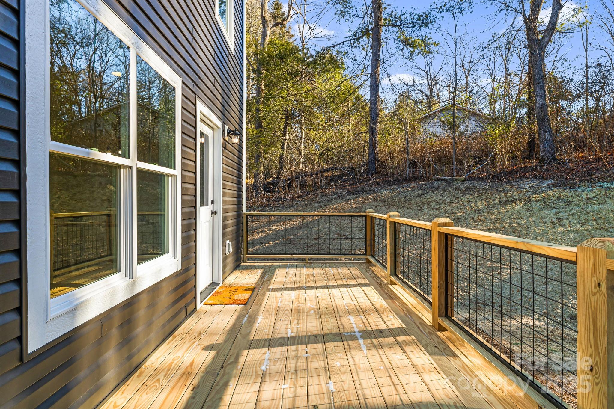 386 Holtzclaw Street Canton, NC 28716 - Photo 7 of 43 a view of balcony with a yard