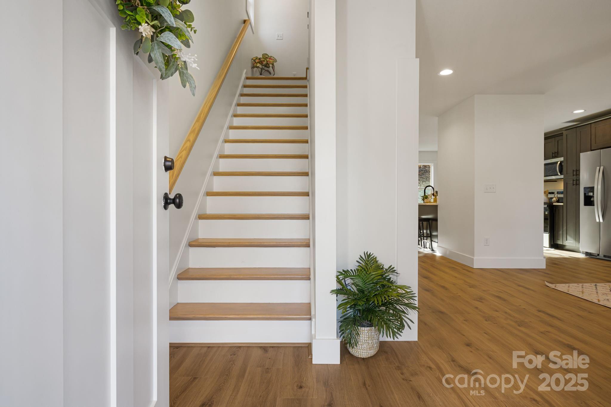 386 Holtzclaw Street Canton, NC 28716 - Photo 10 of 43 a view of entryway with wooden floor