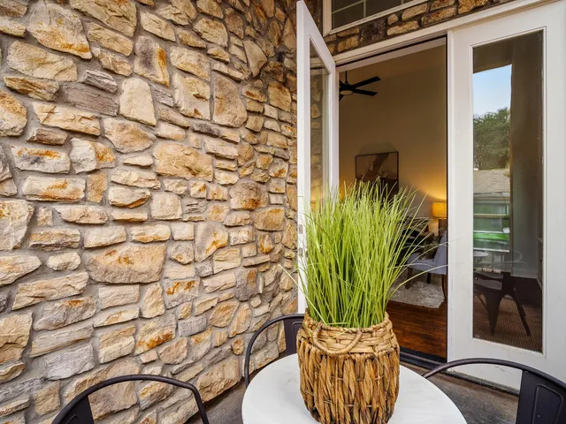 a view of a plant in a glass vase
