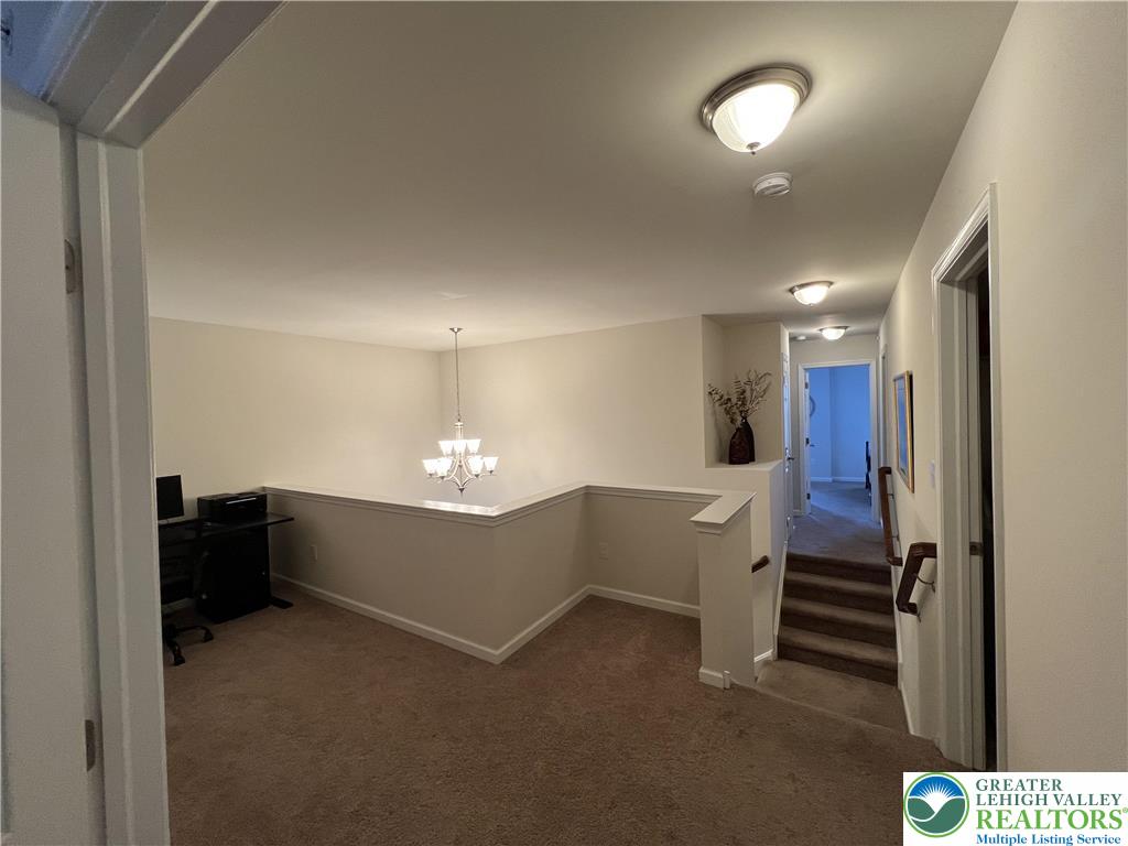 5380 Jutland Road Allentown, PA 18104 - Photo 16 of 27 A versatile loft space, perfect for an office or additional living area, overlooks the entry below.