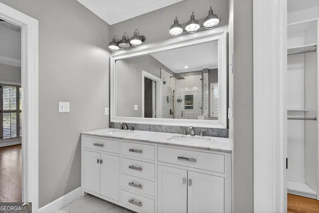 a bathroom with a bathtub and shower