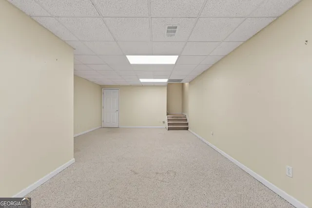 a view of a room with a flat screen tv