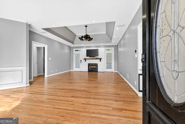 a kitchen with stainless steel appliances granite countertop a sink cabinets and window