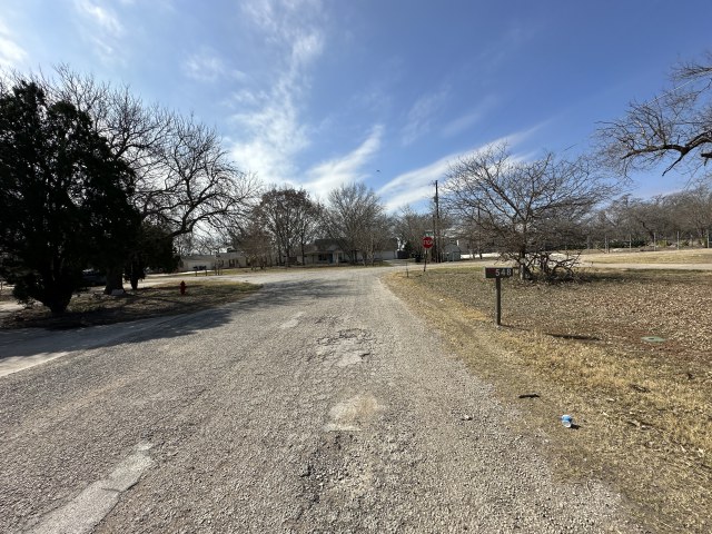 548 Spring River Drive Martindale, TX 78655 - Photo 4 of 17 View of asphalt road with traffic signs