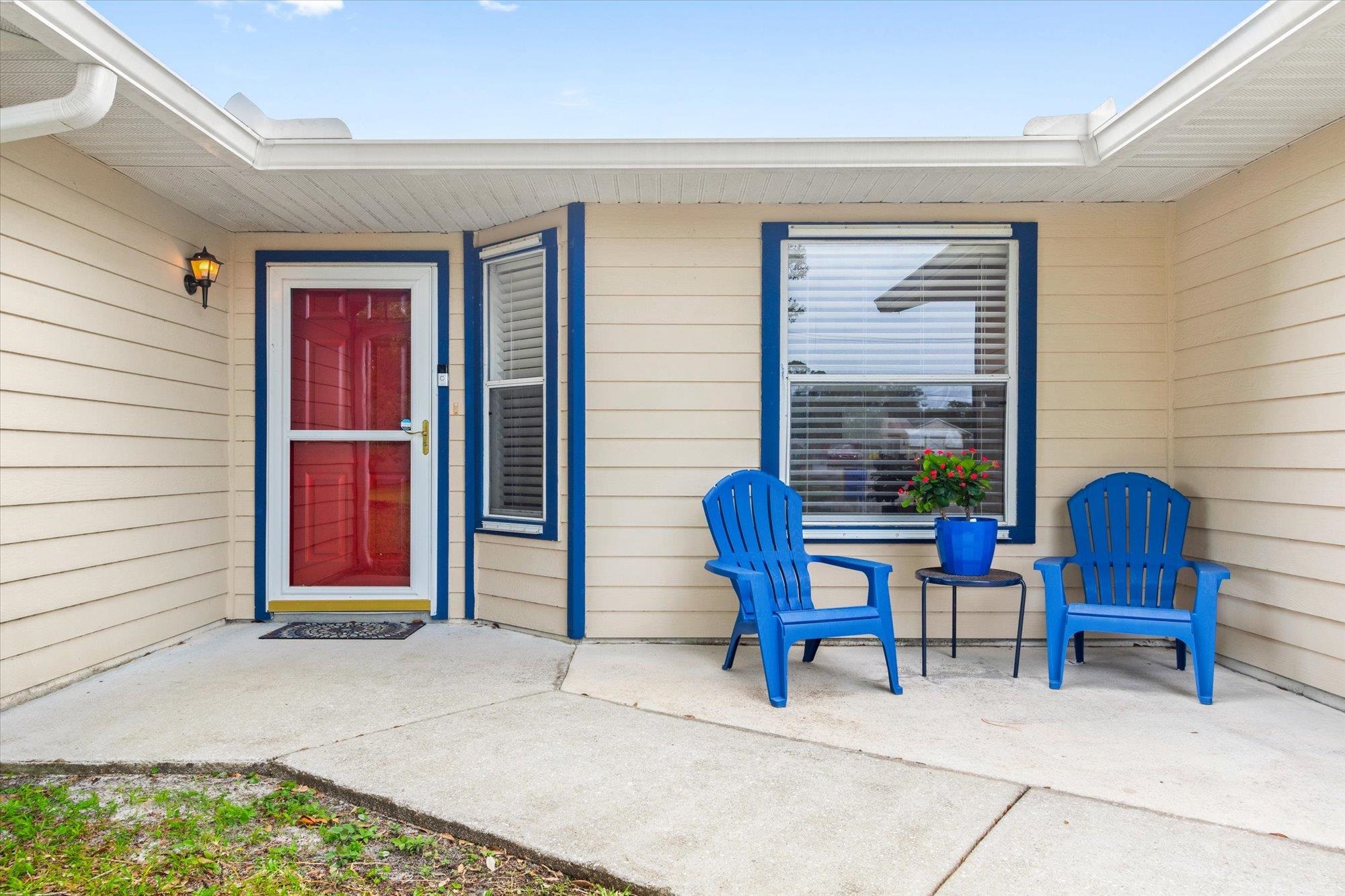 2910 Yule Tree Drive Edgewater, FL 32141 - Photo 3 of 44 a view of a chairs in front of house