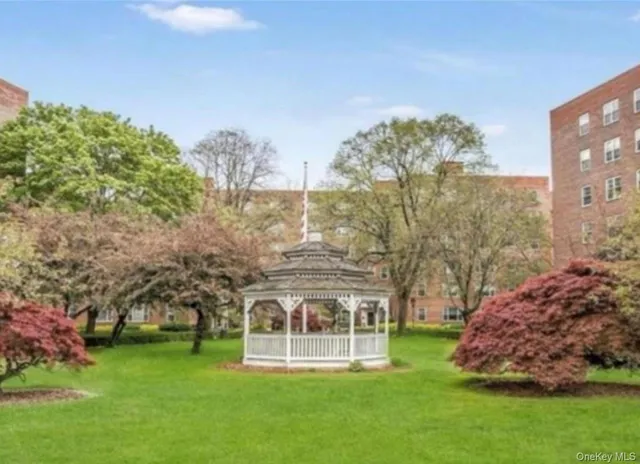 a view of a swimming pool with a garden