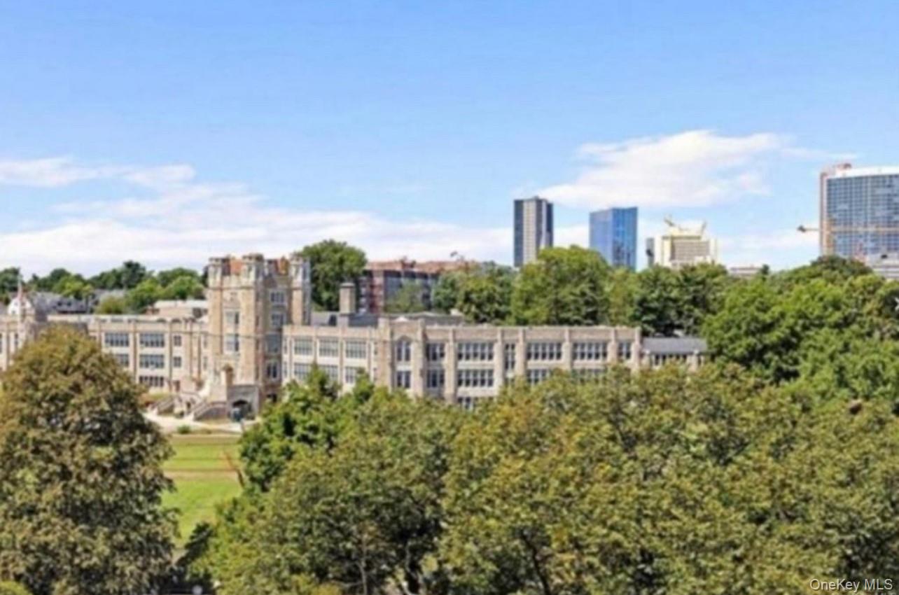 230 Pelham Road, Unit 6F New Rochelle, NY 10805 - Photo 28 of 29 a view of a city with tall buildings and a big yard