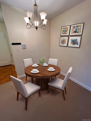 a view of a dining room with furniture