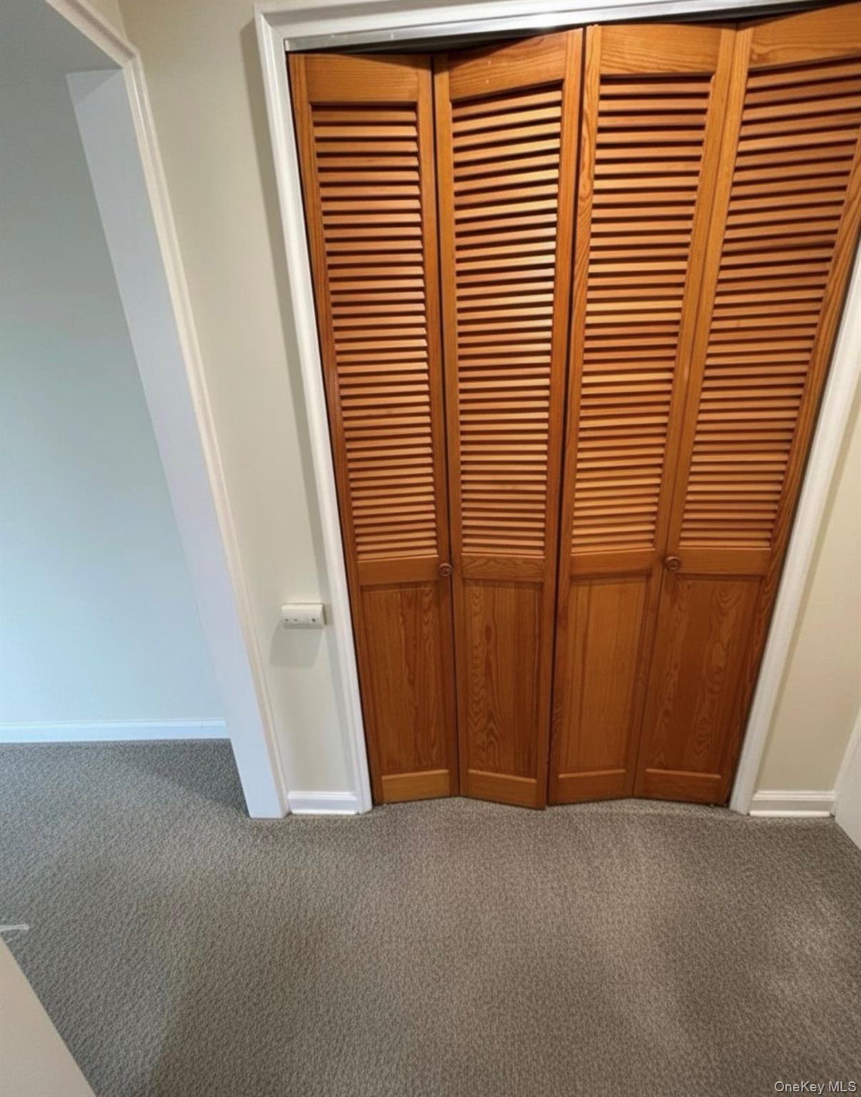 230 Pelham Road, Unit 6F New Rochelle, NY 10805 - Photo 7 of 29 a view of a room with a window