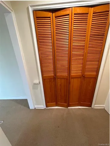 a view of a room with a window