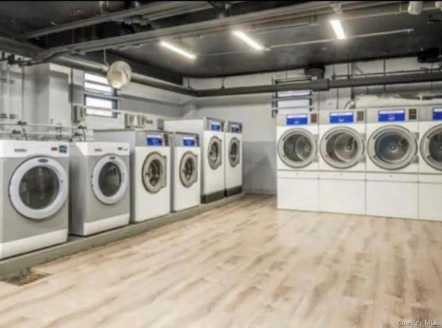 a utility room with dryer and washer