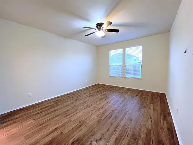 a kitchen with stainless steel appliances kitchen island granite countertop a stove a sink and a microwave