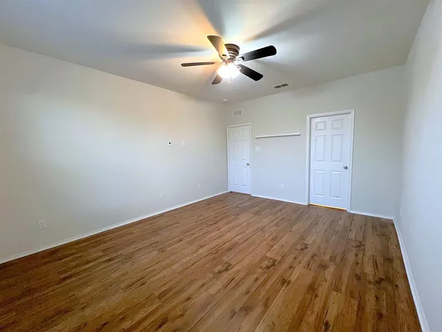 a kitchen with stainless steel appliances granite countertop a sink and a stove