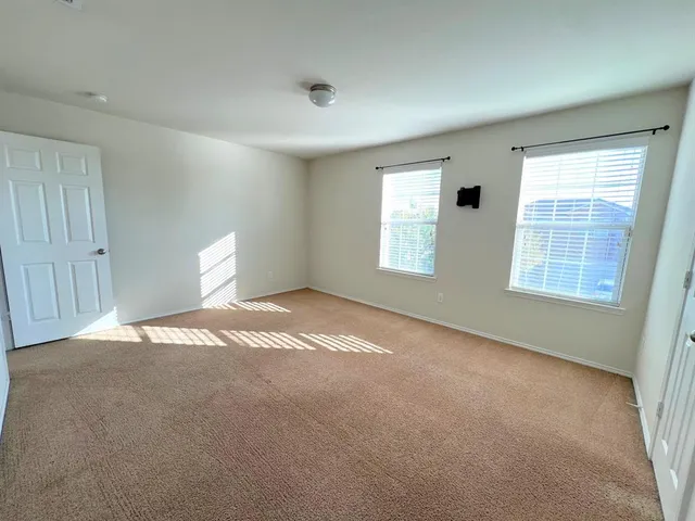 a view of a livingroom with a staircase