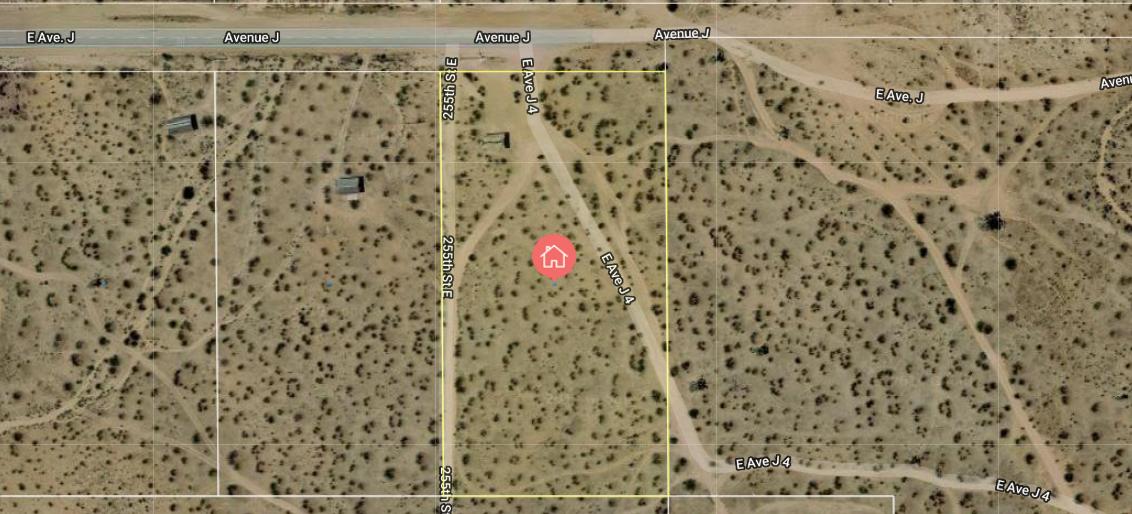 25506 Avenue J Lancaster, CA 93535 - Photo 1 of 1 a bathroom with a shower curtain