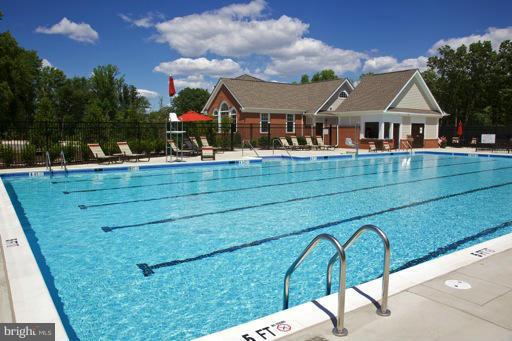 2510 Cherry Tree Road Hanover, MD 21076 - Photo 11 of 13 a front view of a house with garden
