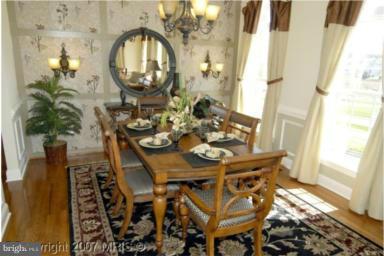 2510 Cherry Tree Road Hanover, MD 21076 - Photo 3 of 13 a view of a dining room with furniture and wooden floor