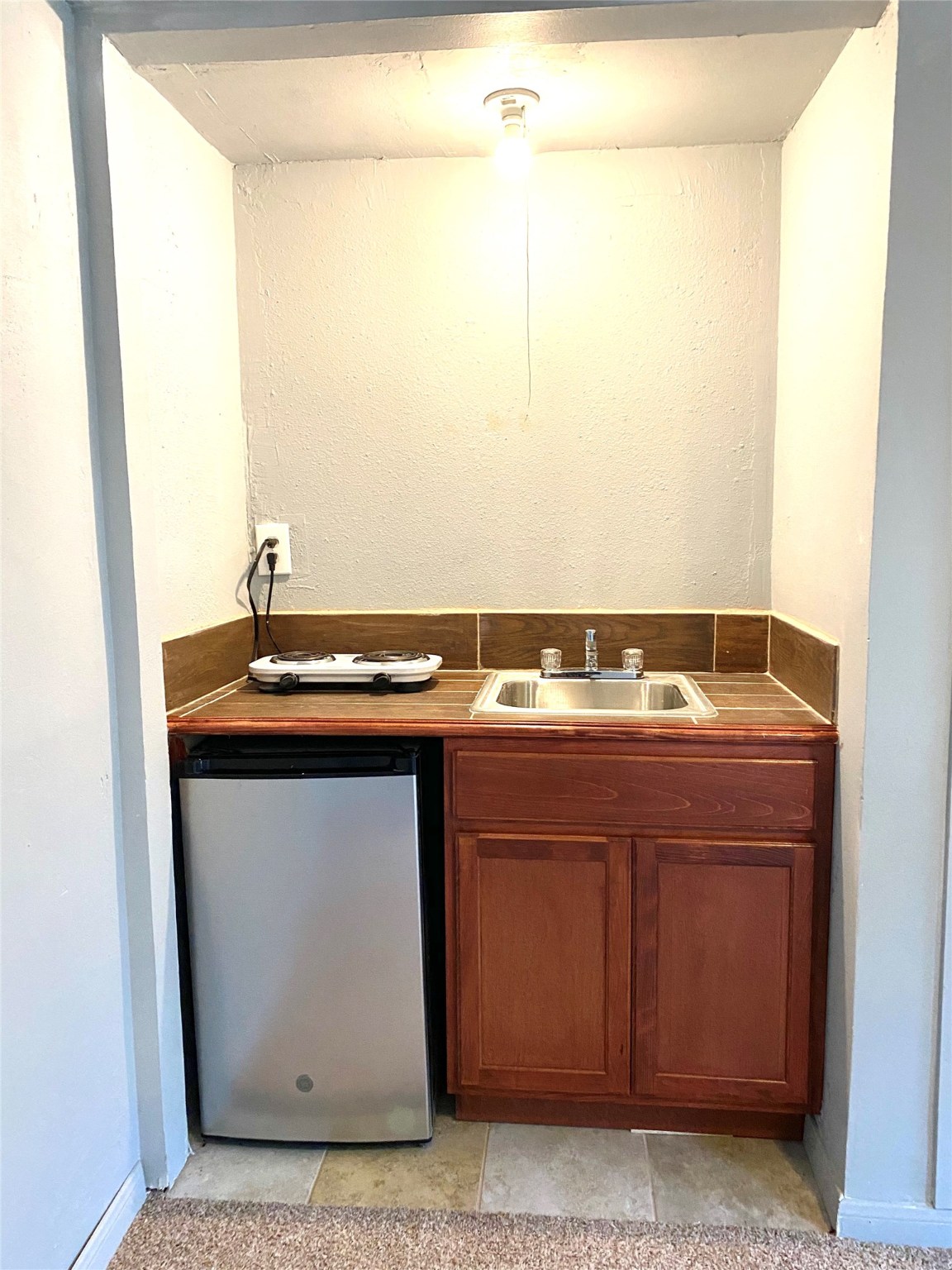 7603 Greendowns Street, Unit B Houston, TX 77087 - Photo 11 of 12 a bathroom with a sink and a mirror