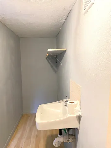 a bathroom with a sink and a vanity