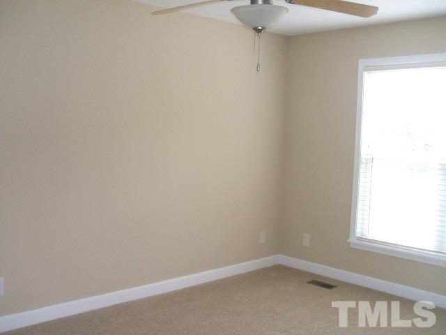 1094 Willie Gray Road Timberlake, NC 27583 - Photo 10 of 15 a room that has a window in it