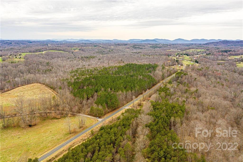 0 Harris Bridge Road Stony Point, NC 28678 - Photo 15 of 16 a view of a lake with a mountain