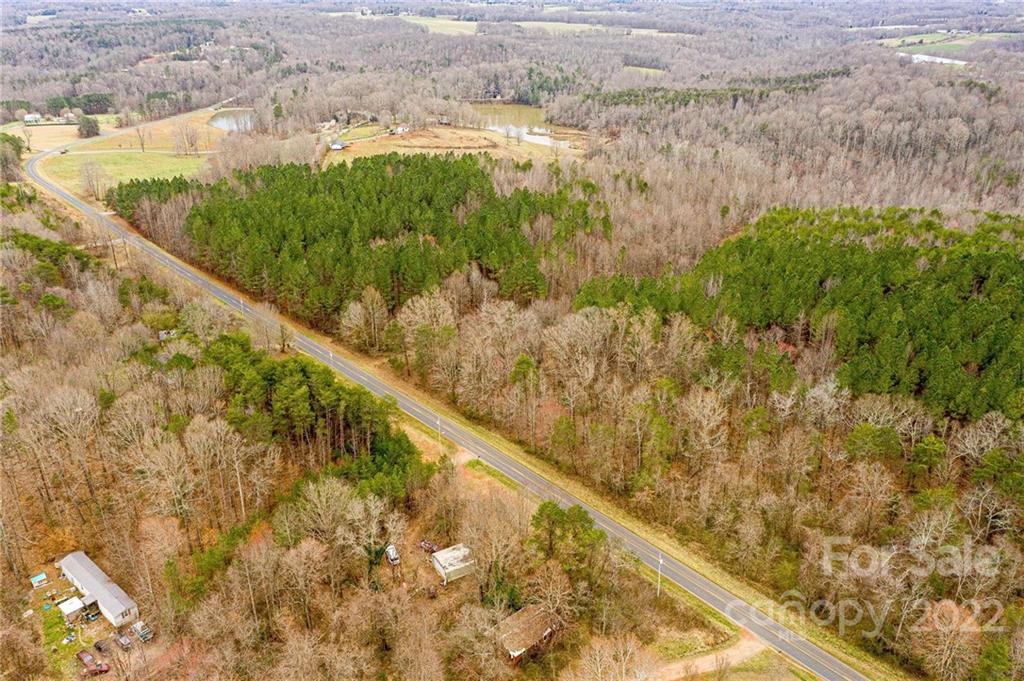 0 Harris Bridge Road Stony Point, NC 28678 - Photo 5 of 16 a view of a lake with a yard