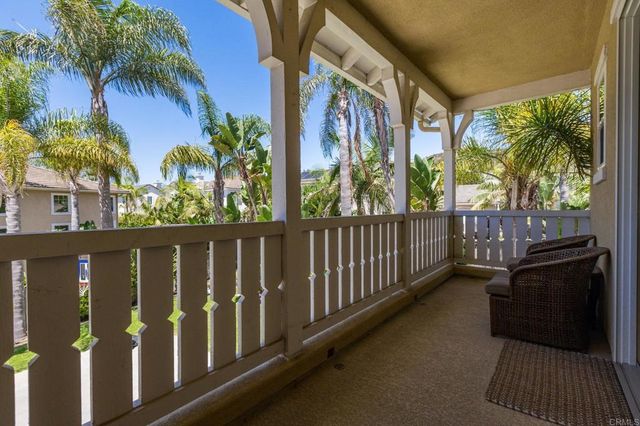 a view of a street view from a balcony