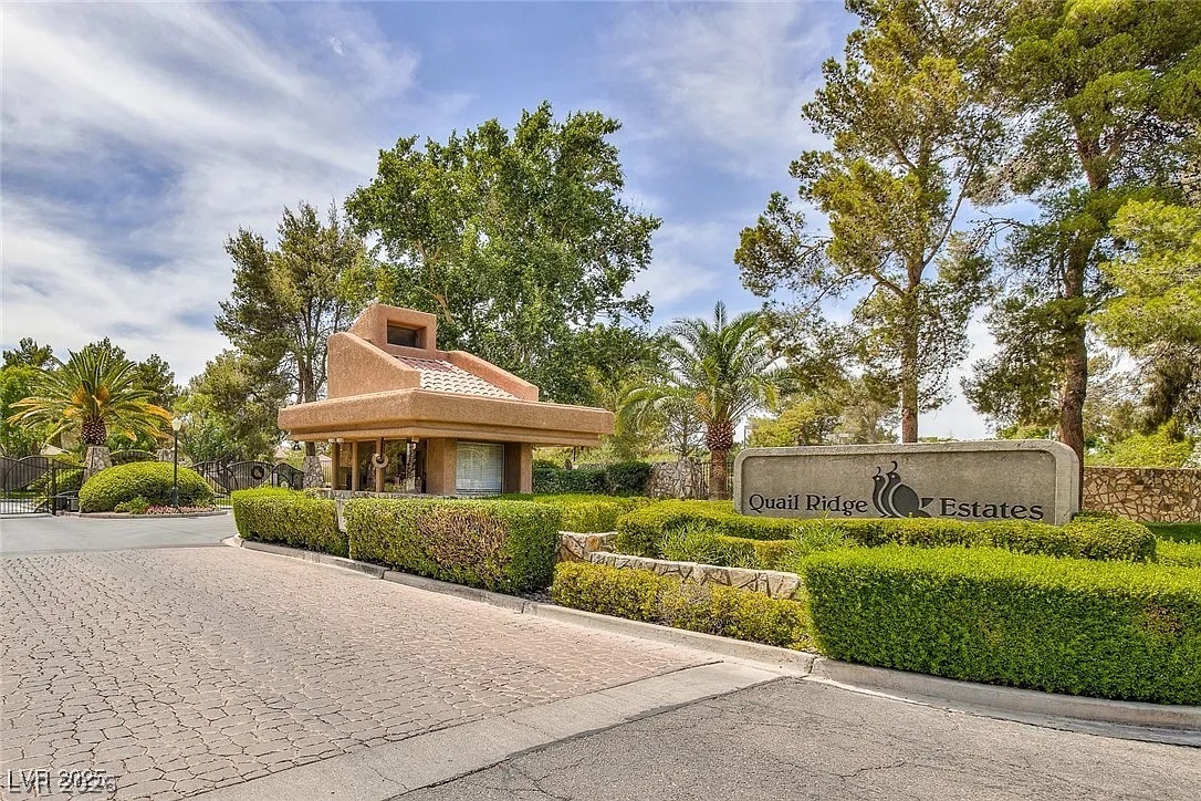 9 Quail Run Road Henderson, NV 89014 - Photo 54 of 57 A welcoming gated entry pavilion with mature landscaping leads into Quail Ridge Estates.