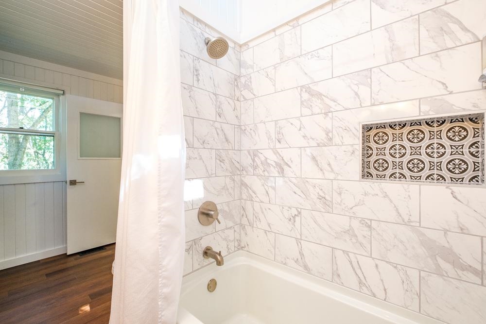 2781 Supinlick Ridge Road Mount Jackson, VA 22842 - Photo 15 of 28 a bathroom with a bathtub and shower