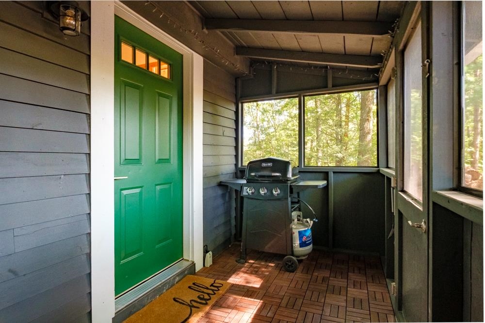 2781 Supinlick Ridge Road Mount Jackson, VA 22842 - Photo 19 of 28 a view of a door and a car parked in the porch