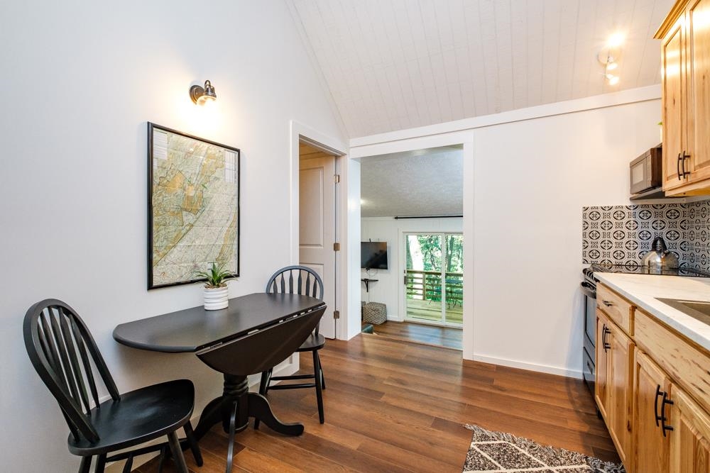 2781 Supinlick Ridge Road Mount Jackson, VA 22842 - Photo 4 of 28 a view of a dining room with furniture window and wooden floor