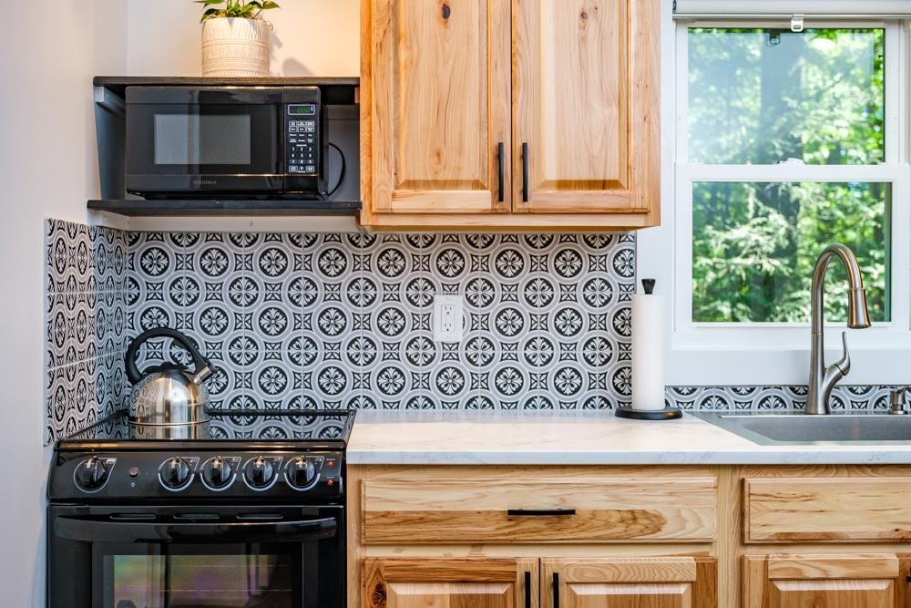 2781 Supinlick Ridge Road Mount Jackson, VA 22842 - Photo 6 of 28 a kitchen with a stove and a microwave