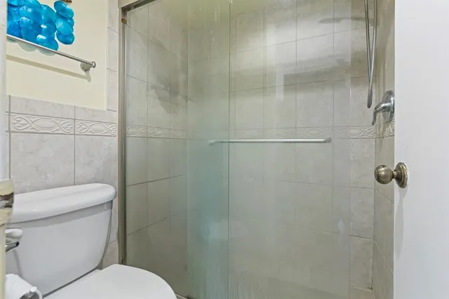 a bathroom with a tub and sink