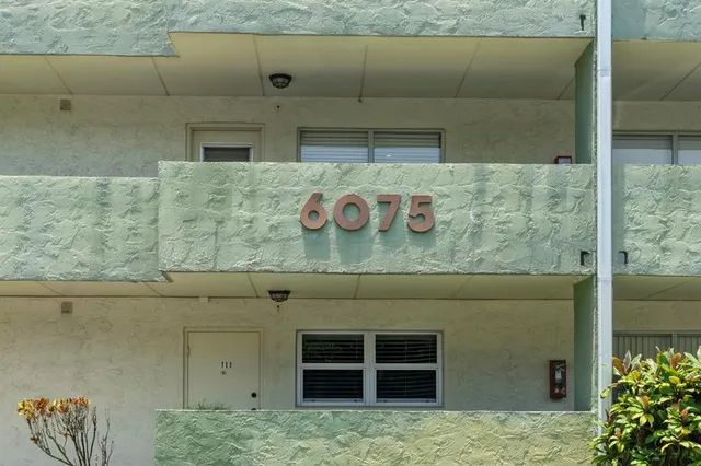 a kitchen with stainless steel appliances a refrigerator and stove