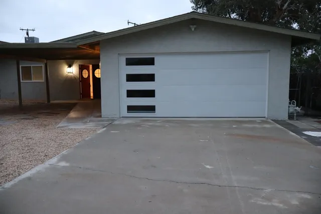 a view of a house with a garage