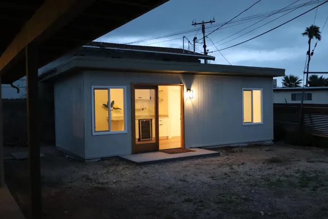 a kitchen with a white cabinets and a stove