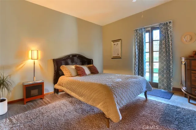 a bathroom with a sink a window and a mirror