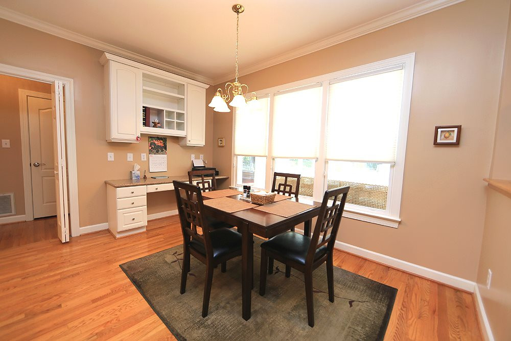 5800 Valley Mist Court Raleigh, NC 27613 - Photo 16 of 30 Desk, hardwood floor, great view of the yard Breakfast Room