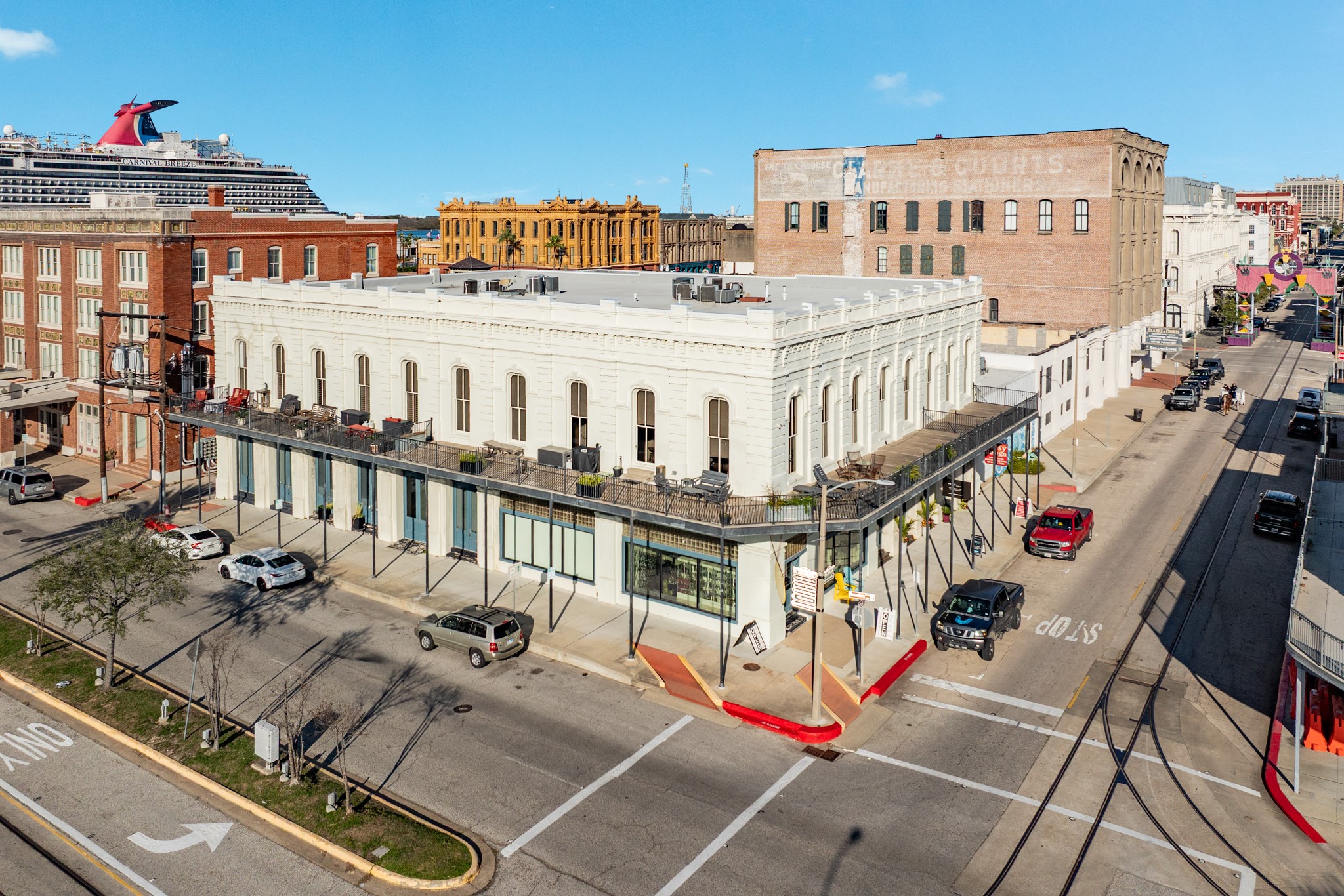 214 Rosenberg Street, Unit 214 Galveston, TX 77550 - Photo 1 of 41 a view of building with an outdoor space